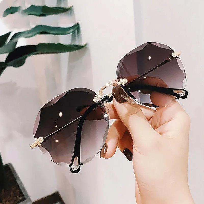 Trendy Polygonal Sunglasses Rimless Trimmed Sunglasses.